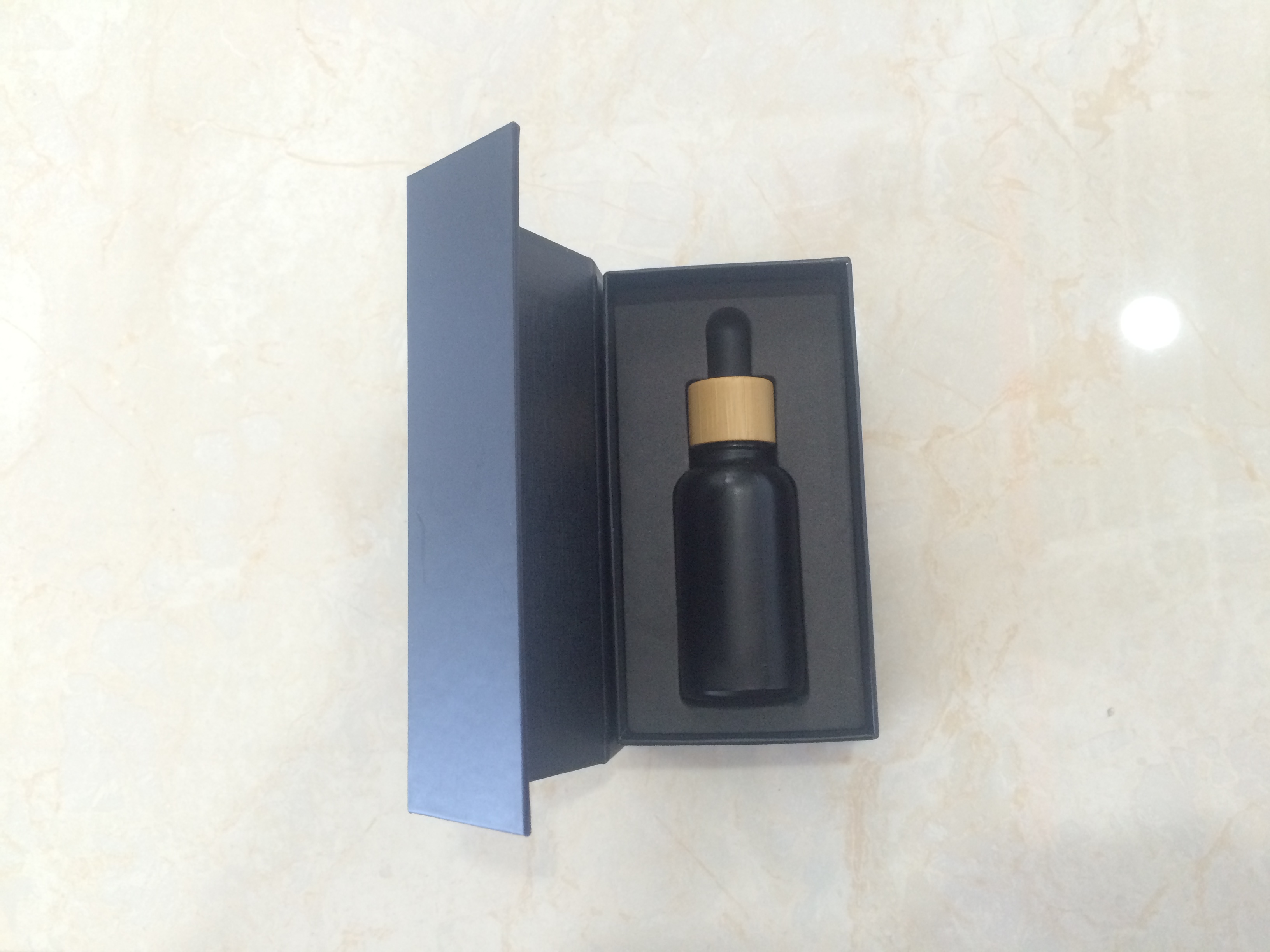 Hot sales 30ml colorful glass dropper bottle with bamboo cap and customized Paper box and tube with stocks