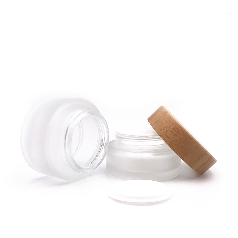 Hot sales frosted empty glass cosmetic jar with wooden/bamboo lid for packaging