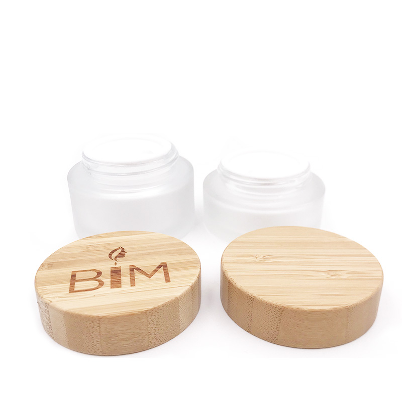 Hot sales frosted empty glass cosmetic jar with wooden/bamboo lid for packaging