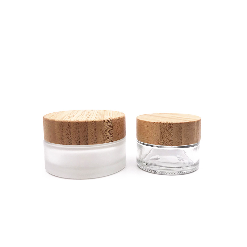Hot sales frosted empty glass cosmetic jar with wooden/bamboo lid for packaging