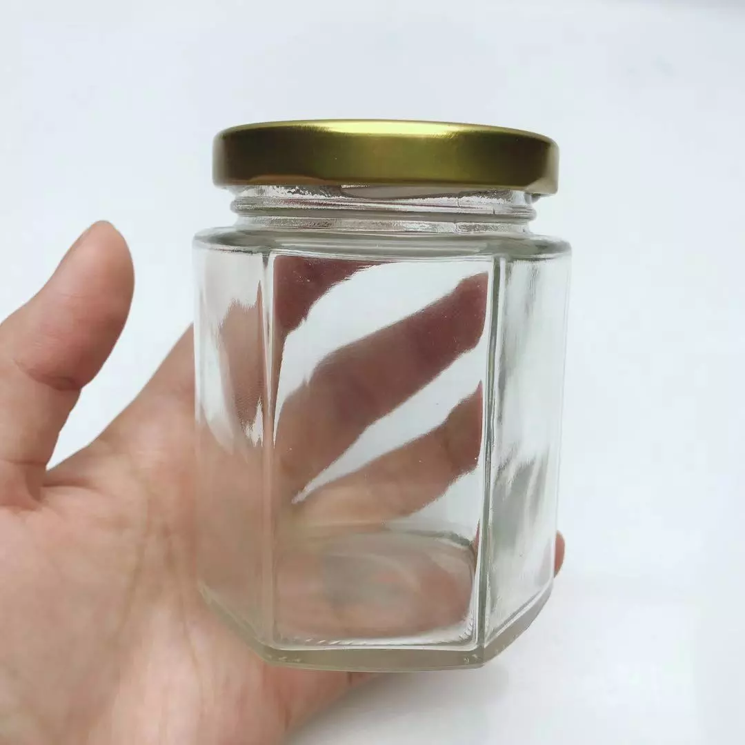 Hot sales honey bee bottles mini honey glass jars with lids for honey