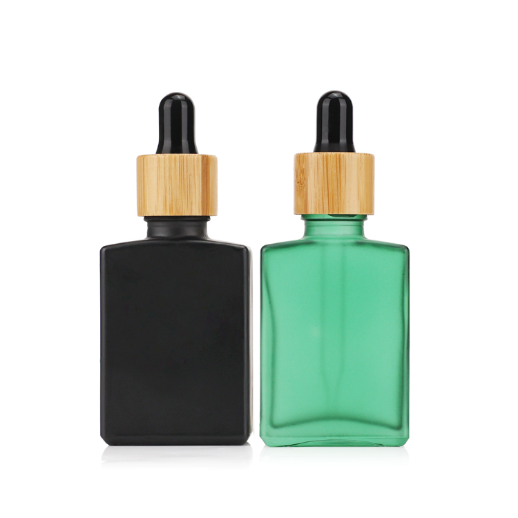 Hot sell 1oz 30ml frosted black colored square rectangular glass dropper bottle with black and bamboo cover with high quality