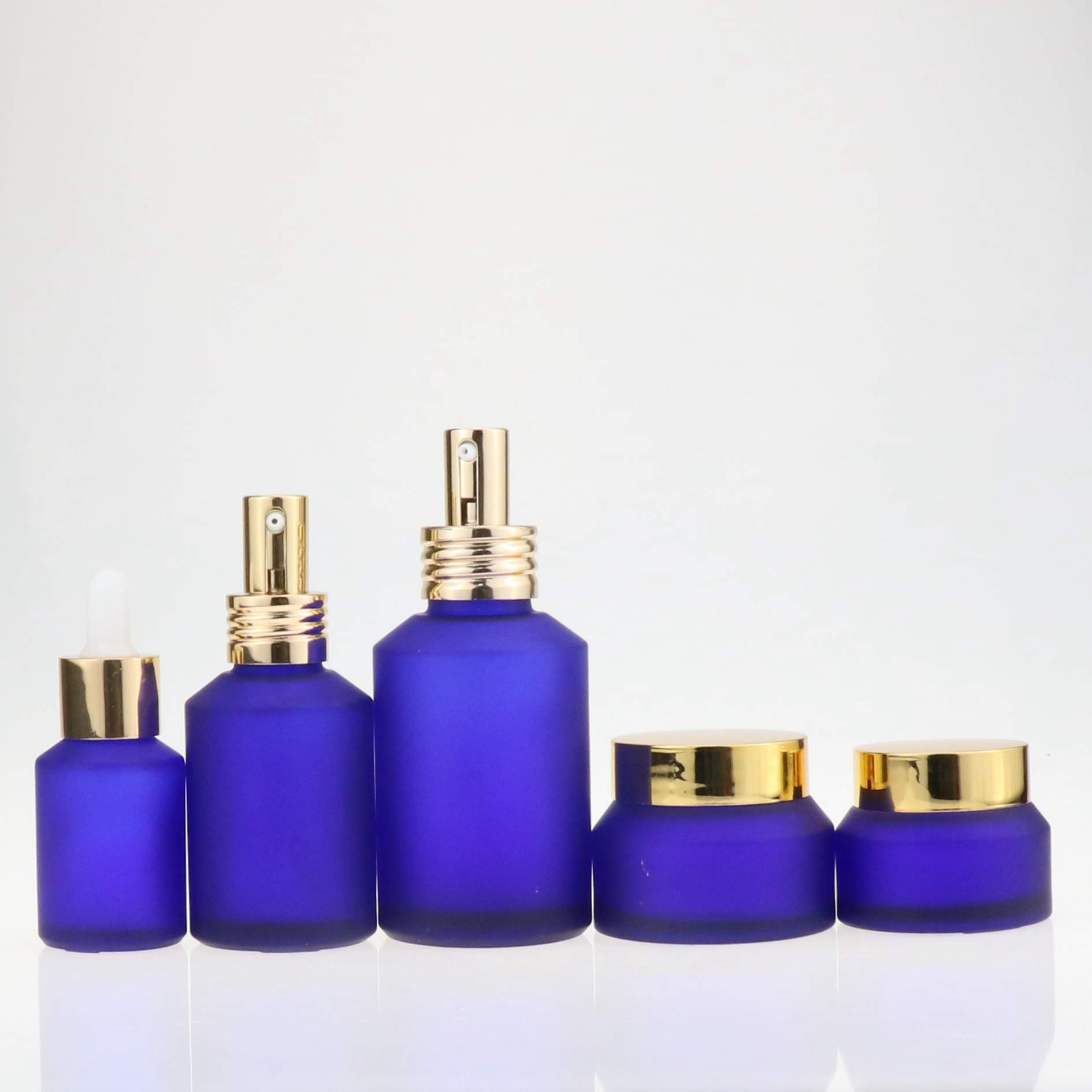 Hot sell beautiful blue glass jars with frosted black plastic cap