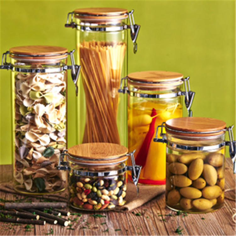 Hot sell borosilicate kitchen storage glass jar spice tea nut container with bamboo or wood lid