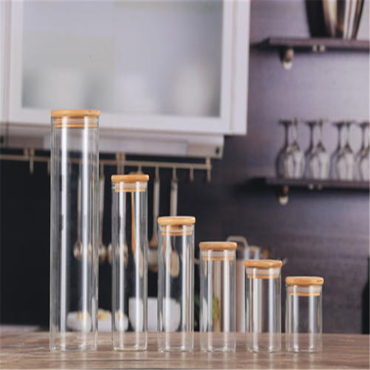 Hot sell borosilicate kitchen storage glass jar spice tea nut container with bamboo or wood lid