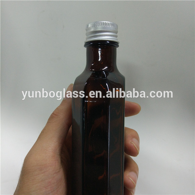 Hot selling 150ml flat amber glass pharmaceutical bottle Morocco oil glass bottle