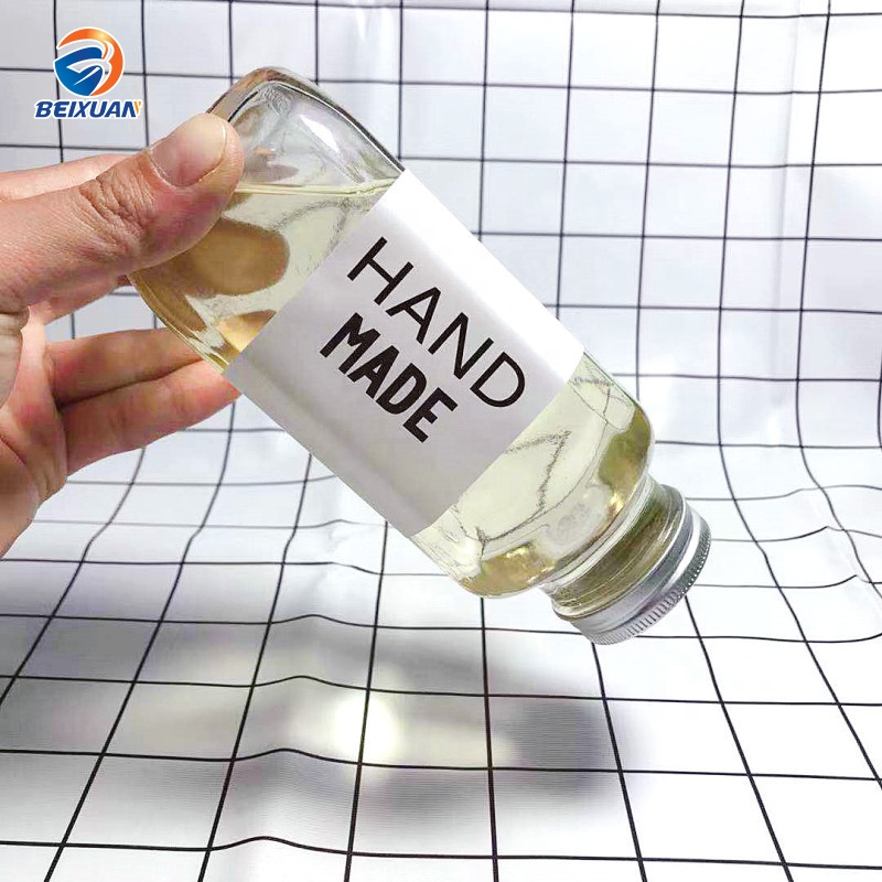 Hot selling 2oz 60ml Clear Glass Shots Square French Mini Bottle with Plastic Screw Cap for Juice Beverage