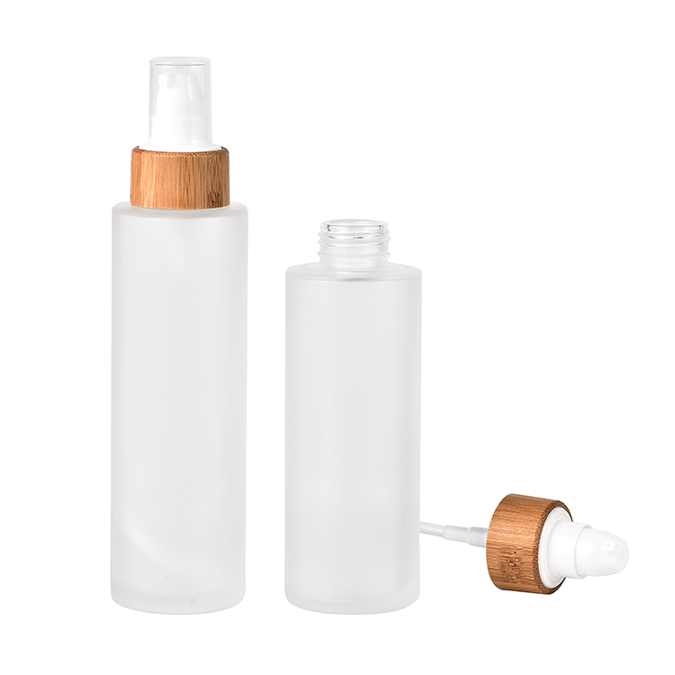 Hot selling 30ml 50ml 100ml 120ml frosted cosmetic glass lotion bottle with bamboo pump caps