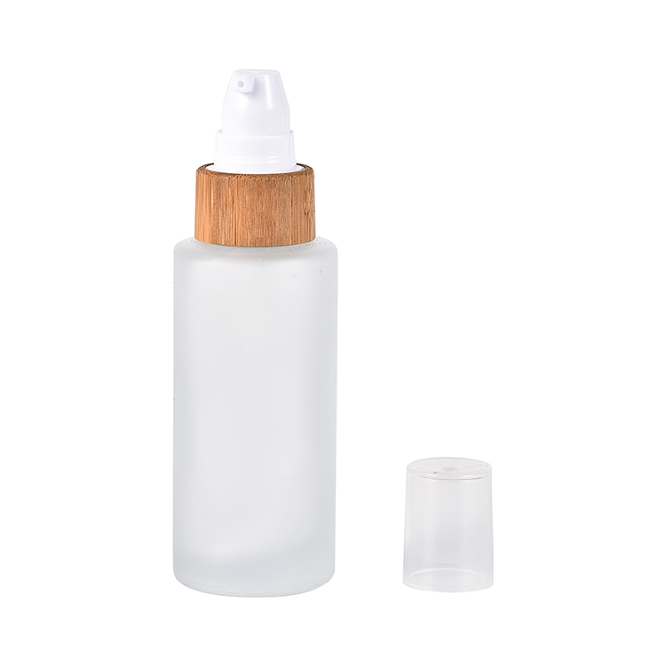 Hot selling 30ml 50ml 100ml 120ml frosted cosmetic glass lotion bottle with bamboo pump caps
