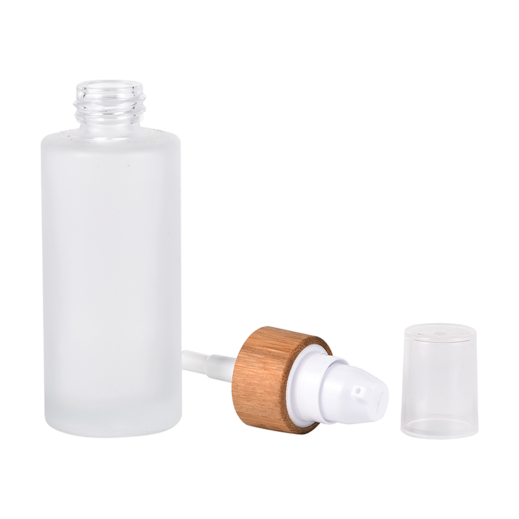 Hot selling 30ml 50ml 100ml 120ml frosted cosmetic glass lotion bottle with bamboo pump caps