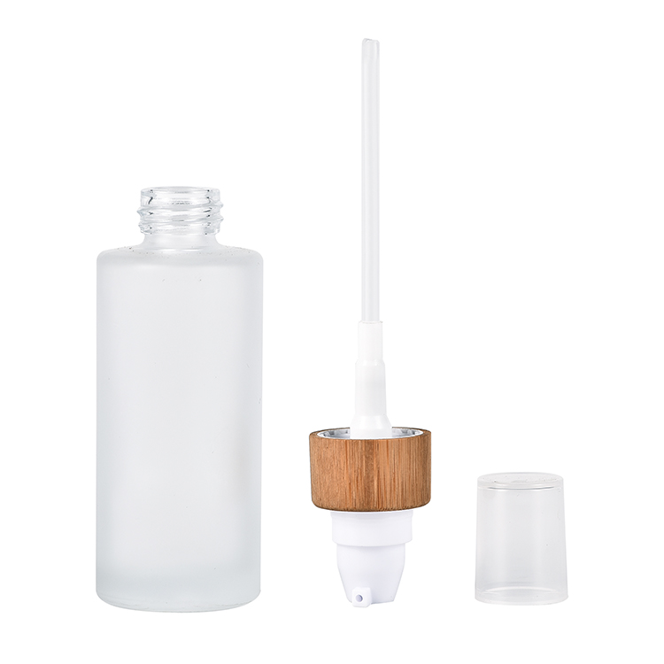 Hot selling 30ml 50ml 100ml 120ml frosted cosmetic glass lotion bottle with bamboo pump caps