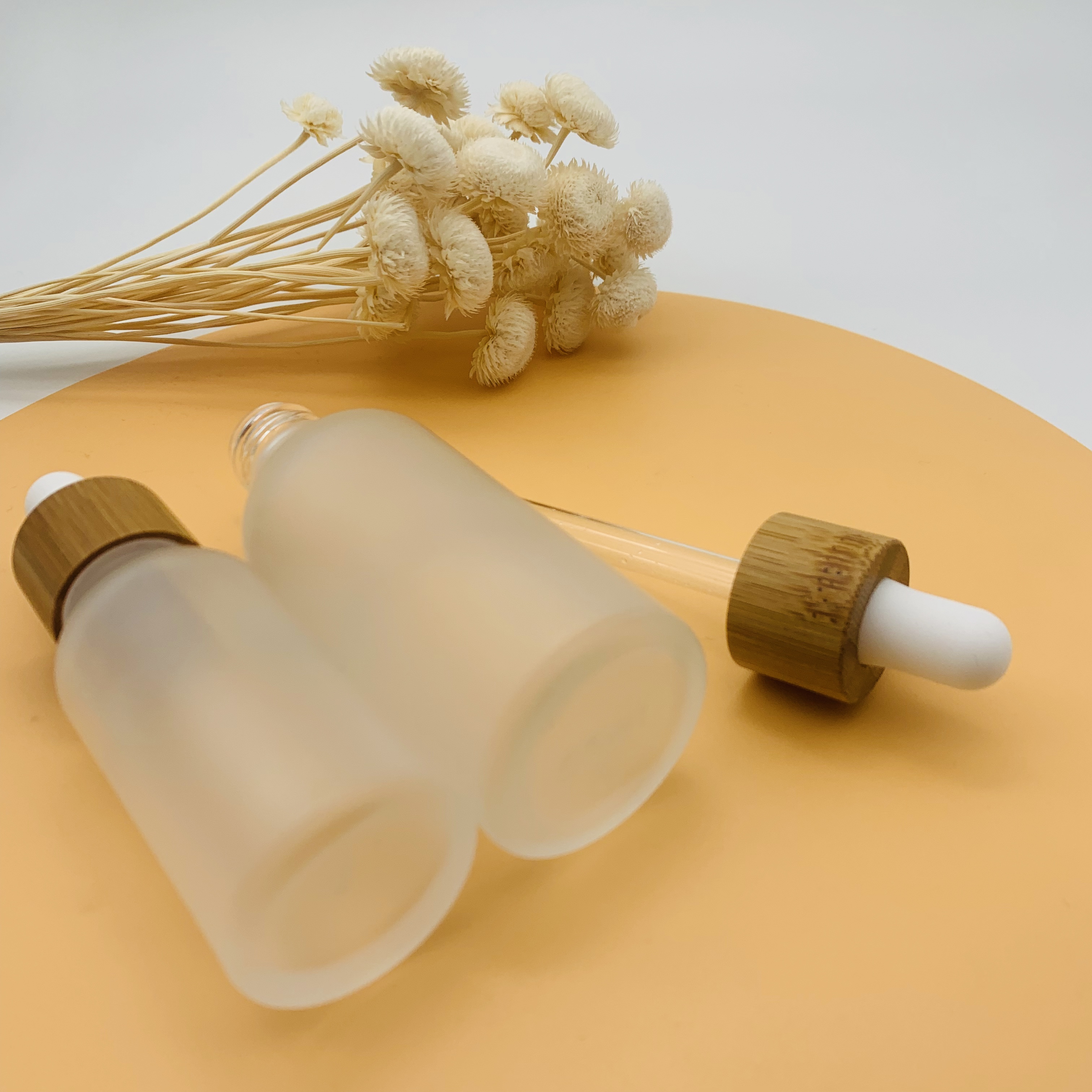 Hot selling 30ml 50ml Essential Oil Glass Dropper Bottle Frosted Glass Bottle with Bamboo Cap