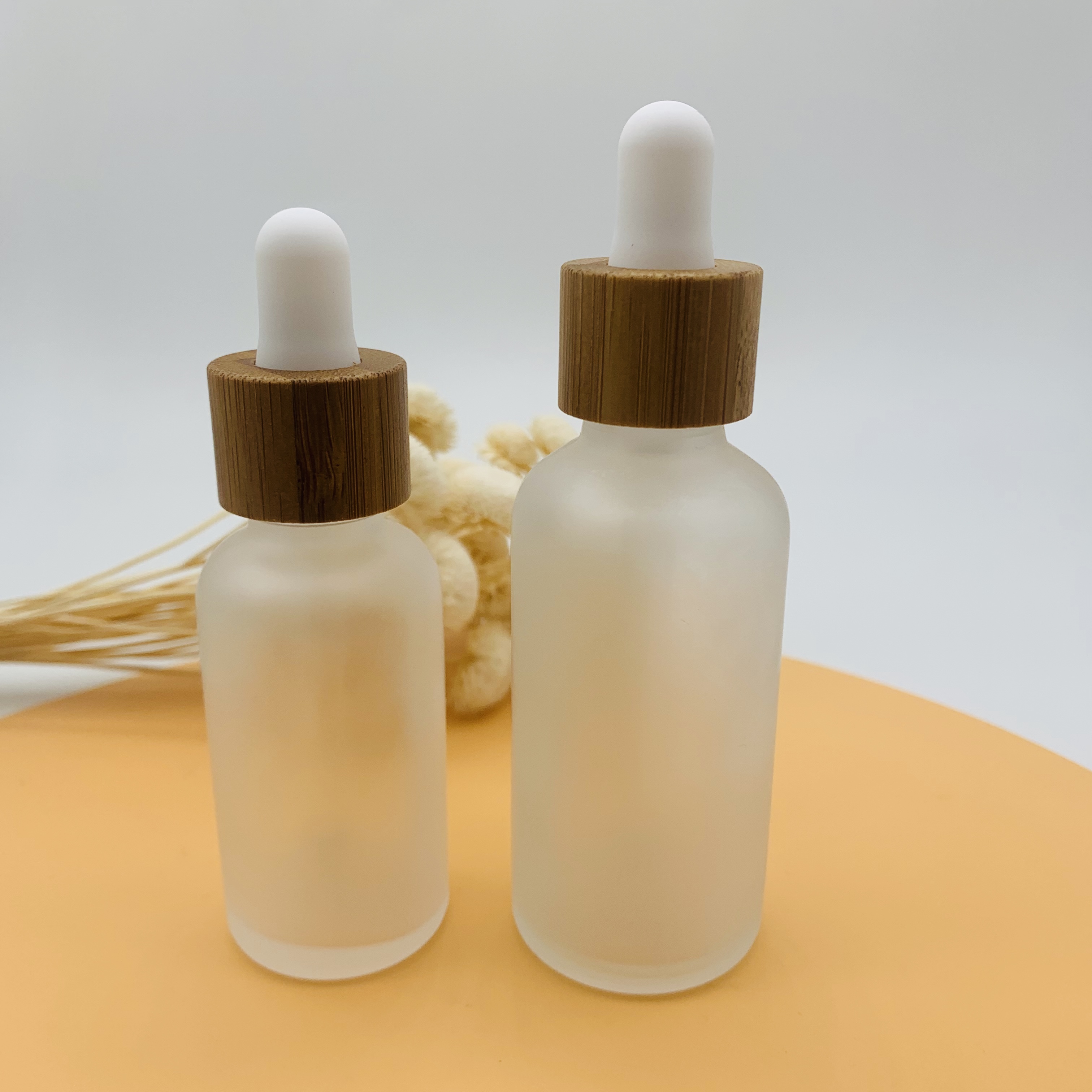 Hot selling 30ml 50ml Essential Oil Glass Dropper Bottle Frosted Glass Bottle with Bamboo Cap