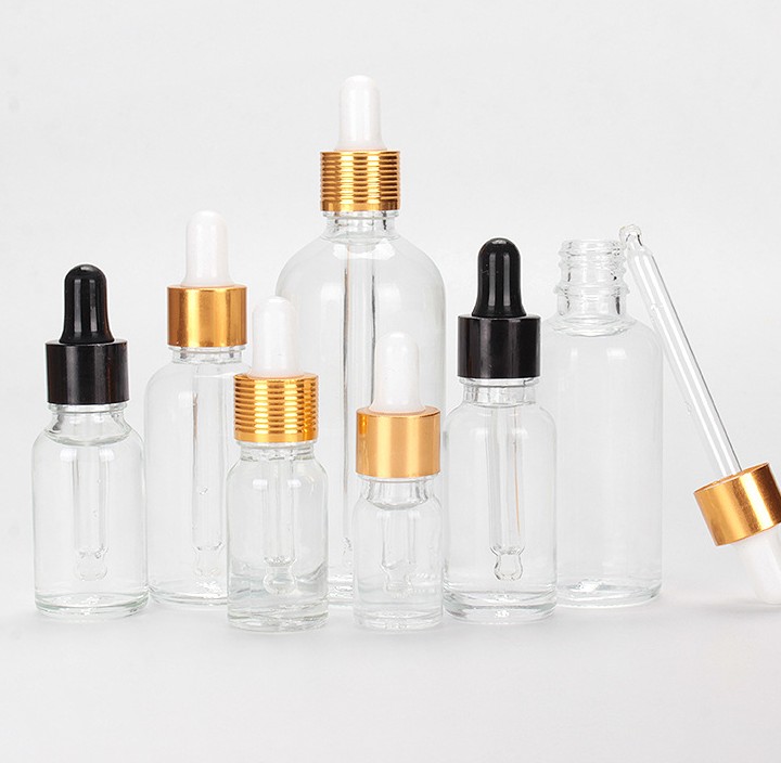 Hot selling 5ml/10ml/15ml/20ml/30ml/50ml/100ml amber clear green blue essential oil glass dropper bottle for cosmetic