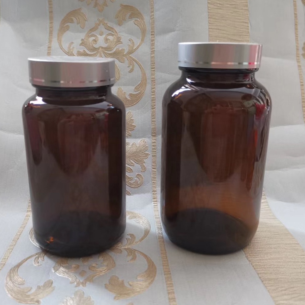 Hot selling 60cc 75cc 100cc Amber Wide Mouth Tablet Glass Bottle With Aluminum screrw cap for health care