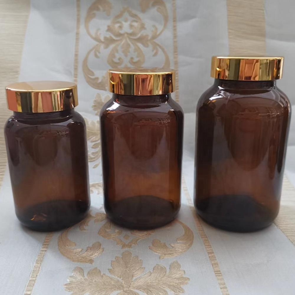 Hot selling 60cc 75cc 100cc Amber Wide Mouth Tablet Glass Bottle With Aluminum screrw cap for health care