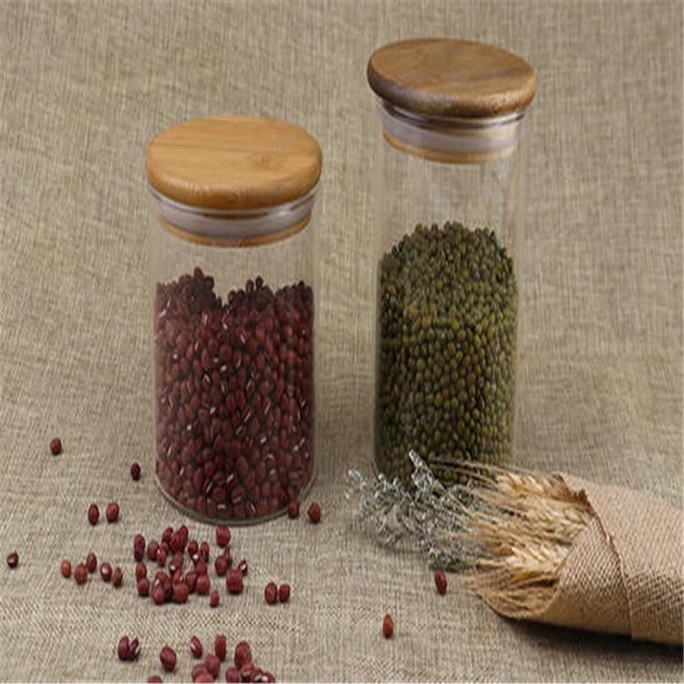 Hot selling Clear Leaf Free Food Borosilicate Glass Storage Bottles Jars Containers with Bamboo Lid