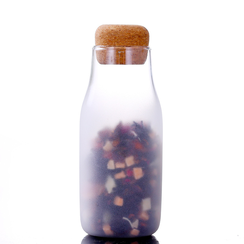 Hot selling cheap glass bottles wholesale 600 ml kitchen glass jars new product glass storage jar with cork lid