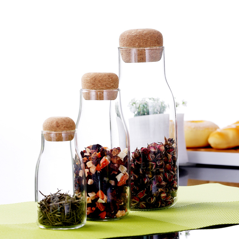 Hot selling cheap glass bottles wholesale 600 ml kitchen glass jars new product glass storage jar with cork lid