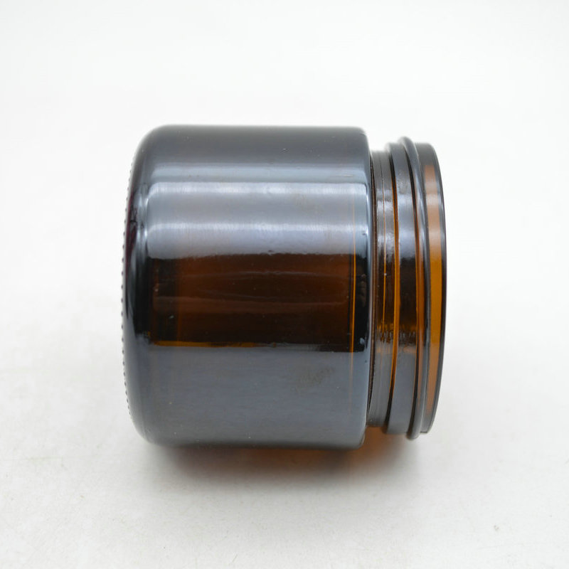 Hot selling custom empty 60g glass cream jar with black cap for lip balm body scrub container