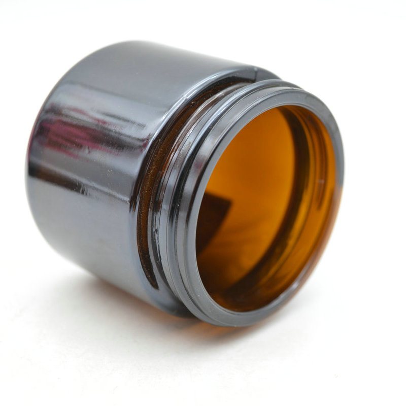 Hot selling custom empty 60g glass cream jar with black cap for lip balm body scrub container
