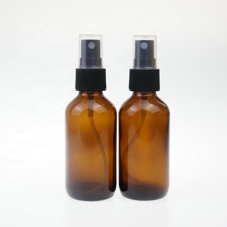 Hot selling empty 60ml boston round amber cosmetic packaging serum container perfume glass spray bottle with sprayer