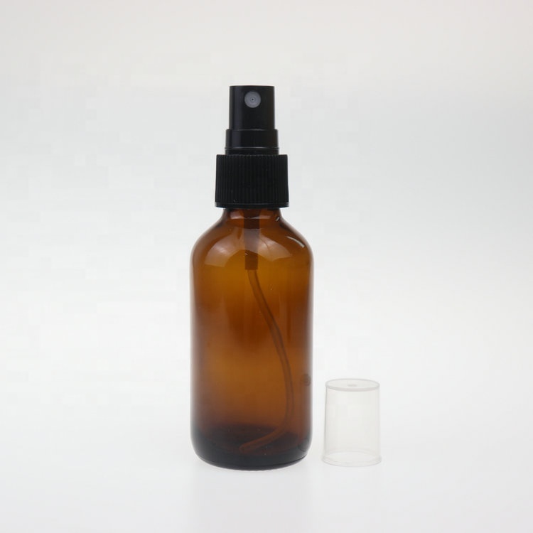 Hot selling empty 60ml boston round amber cosmetic packaging serum container perfume glass spray bottle with sprayer