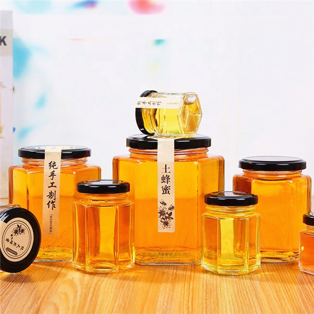 Hot selling honey jar glass bottle hexagonal premium honey bottle