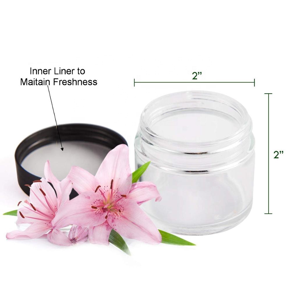 Hotsale 2oz Mini Round Clear Glass Face Cream Jars / Cosmetic Jars with Inner Liners and Black Lids
