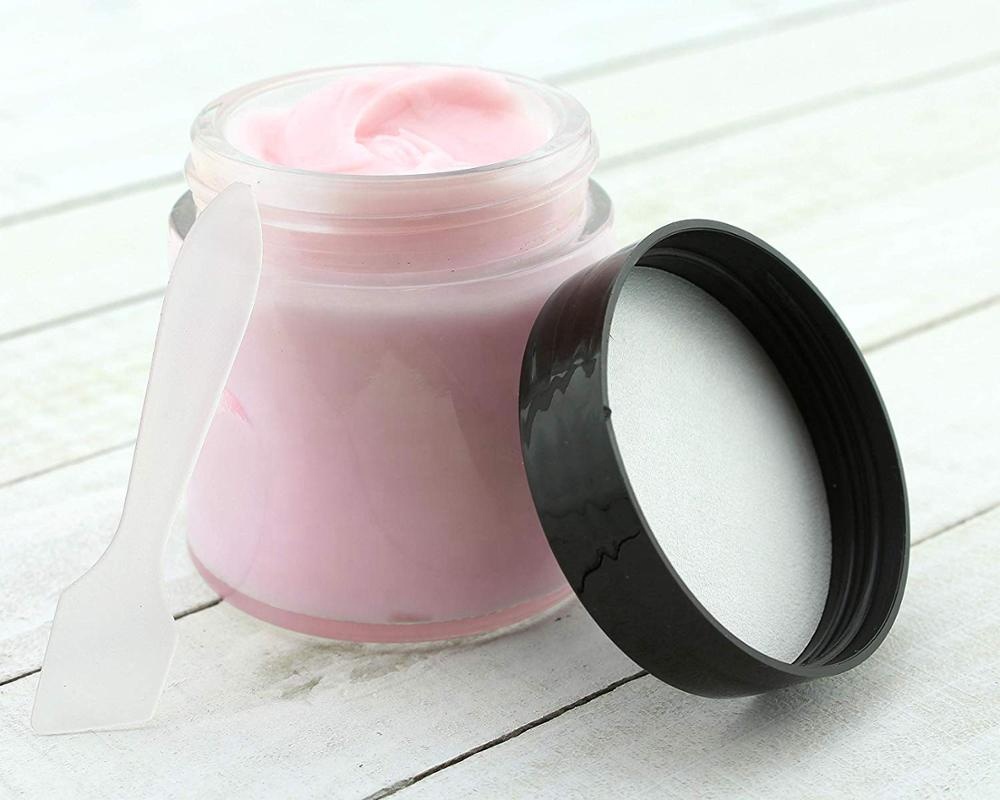 Hotsale 2oz Mini Round Clear Glass Face Cream Jars / Cosmetic Jars with Inner Liners and Black Lids