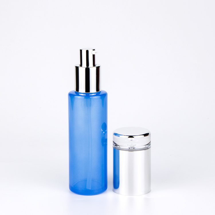 Hotsale Light Blue Transparent Glass Cosmetic Bottle and Jar with Pump and Luxury Water Drop Cap
