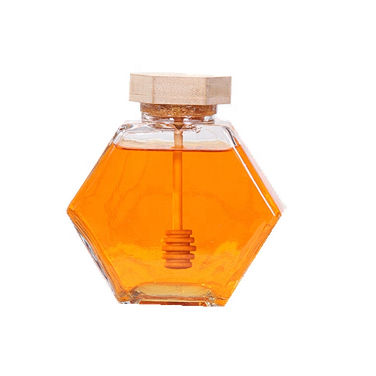 Hotsale hexagonal glass jar with wooden bamboo lid and dipper for honey