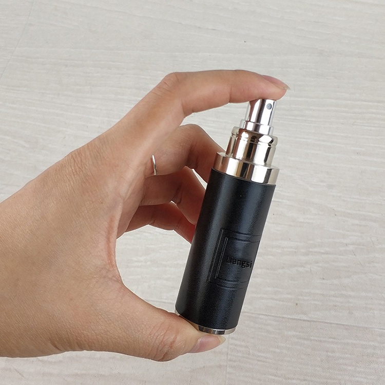ISO BSCI LVMH factory custom aluminum oil perfume spray bottle with spray atomizer mini PU leather empty glass perfume bottle
