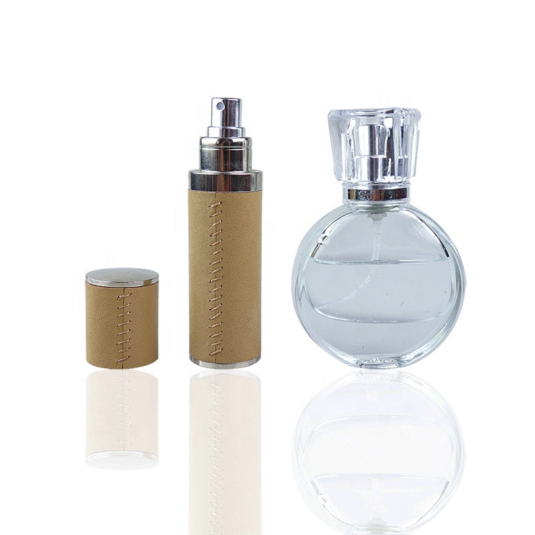ISO BSCI LVMH factory eco friendly luxury twist up glass atomizer sprayer atomizer bottle refillable leather perfume atomizer
