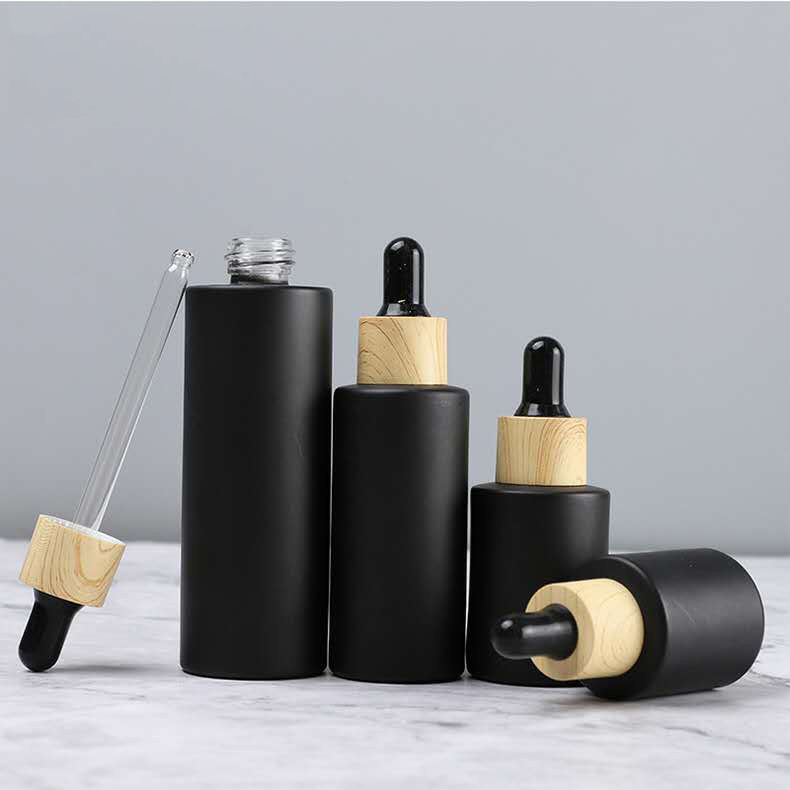 In stock 30ml cosmetic packaging glass essential oil black dropper bottle
