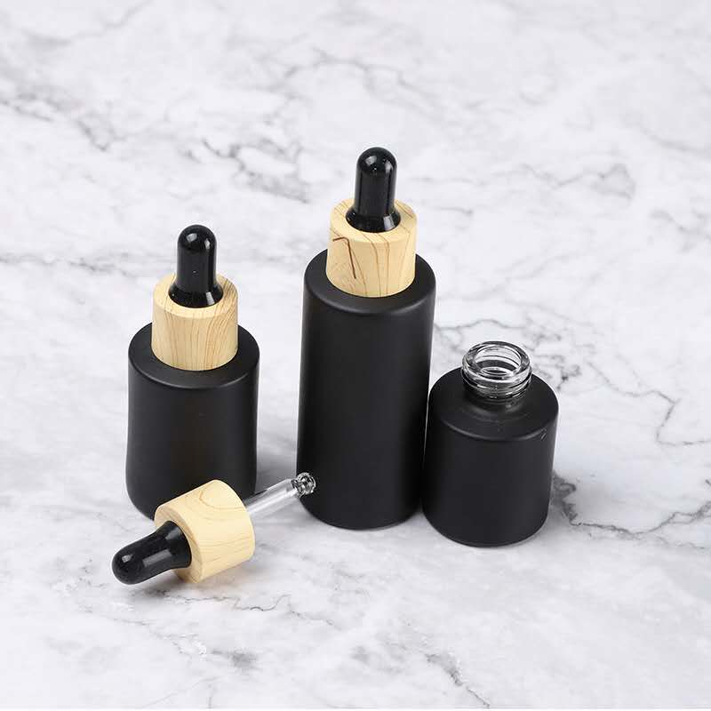In stock 30ml cosmetic packaging glass essential oil black dropper bottle