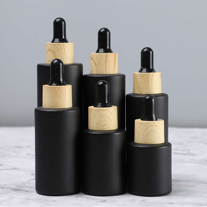 In stock 30ml cosmetic packaging glass essential oil black dropper bottle