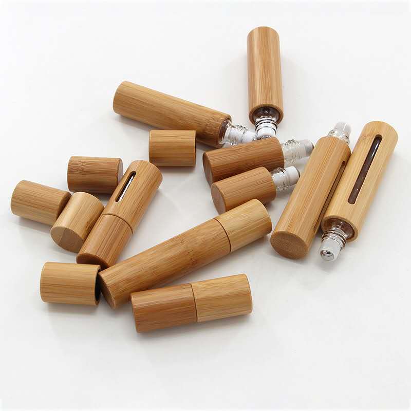 In stock 3ml/5ml /10ml whole cosmetic packaging bamboo glass roller bottles for essential oil