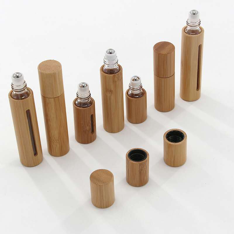 In stock 3ml/5ml /10ml whole cosmetic packaging bamboo glass roller bottles for essential oil