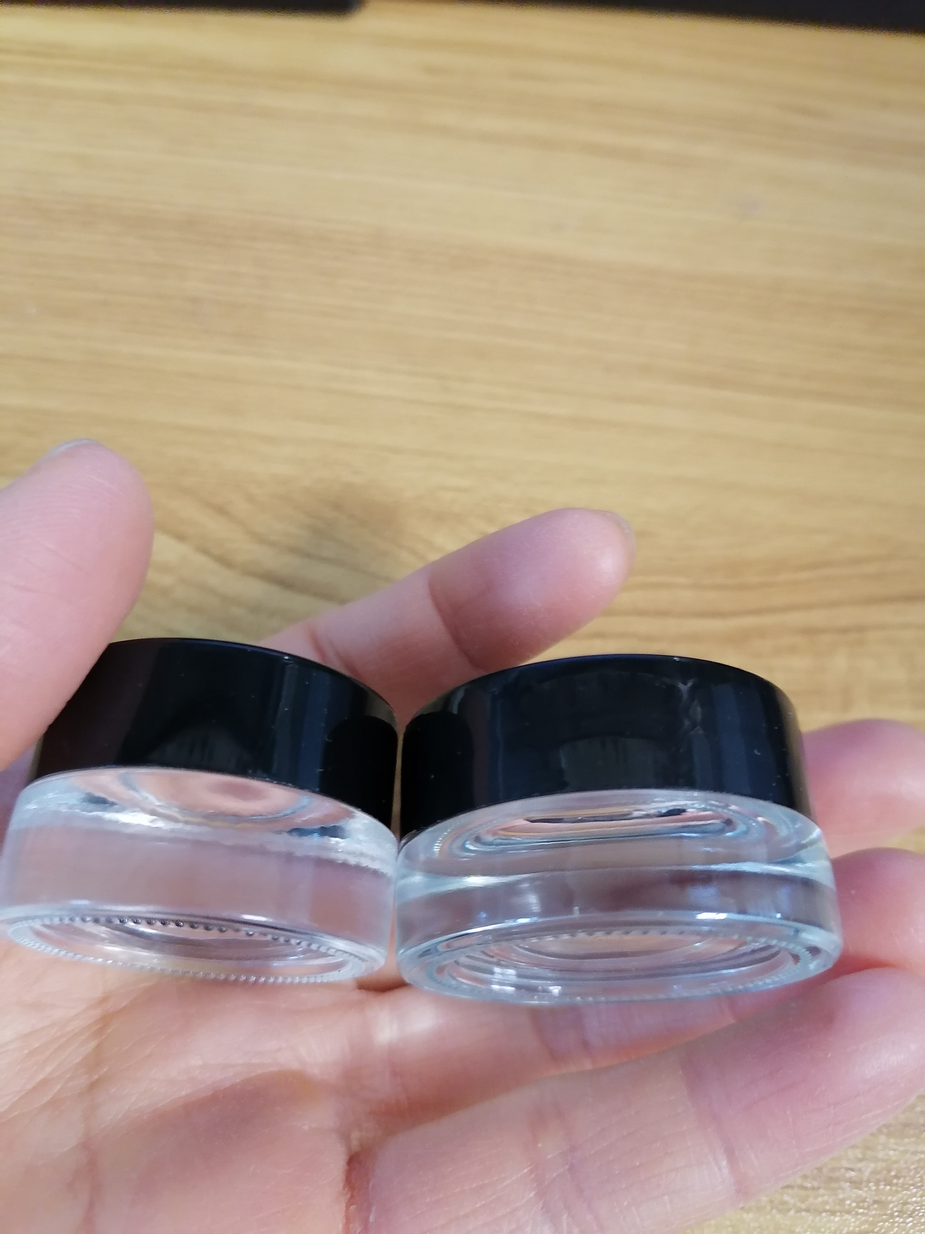 In stock 9ml mini empty round glass bottle for eye cream jar travel cosmetic packaging bottles with black screw cap