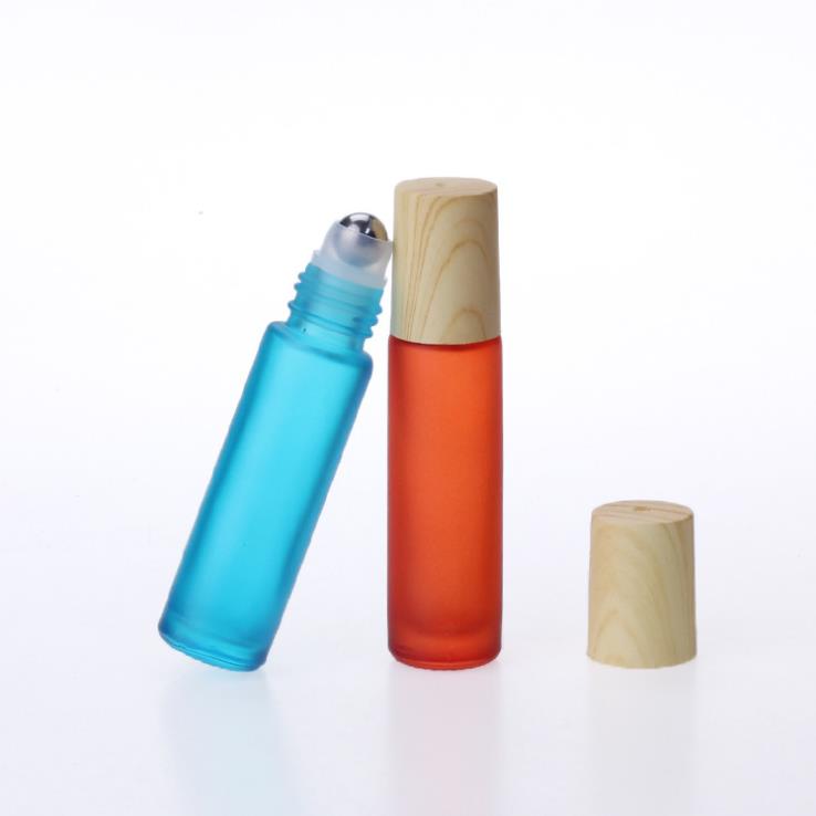 In stock! Frosted matte Rainbow Colors 10ml glass roll on bottle with Wood grain cover/cap essential oil perfume bottle