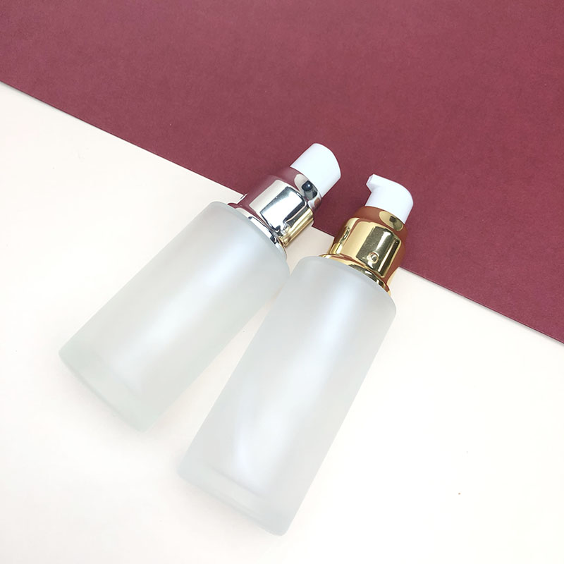 In stock cosmetic lotion pump bottle glass pump bottles empty bottles with lotion pump