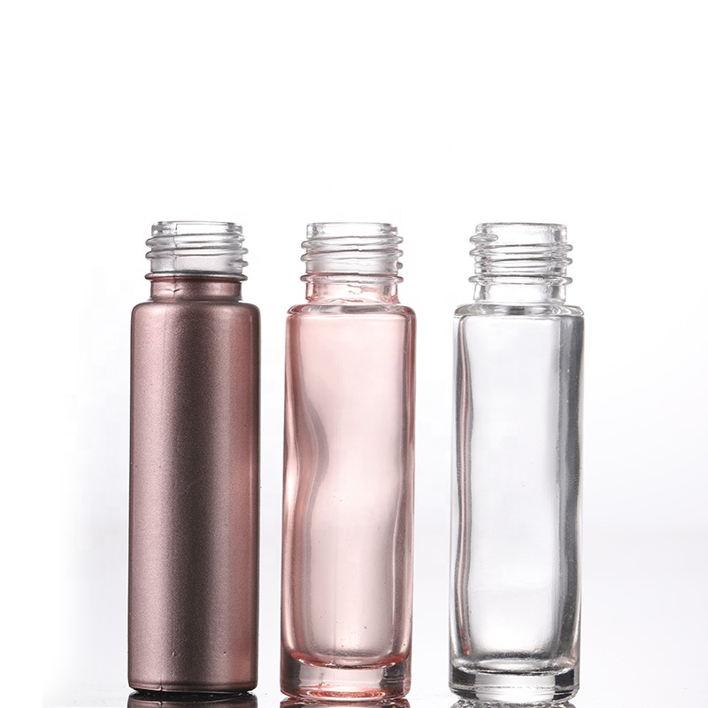In stock custom surface handing spraying process small vials glass bottle 10ml pink roll on bottle