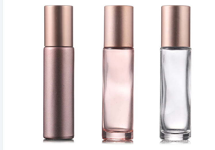 In stock custom surface handing spraying process small vials glass bottle 10ml pink roll on bottle