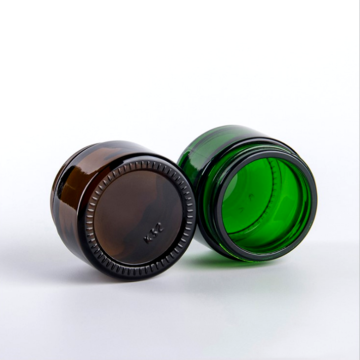 In stock empty amber blue green clear glass cosmetic jars 30g green glass jars for cosmetics