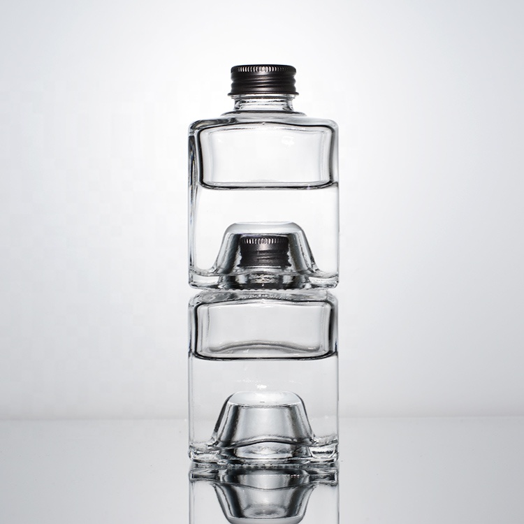 In stock unique shaped 150ml glass bottles with aluminum cap