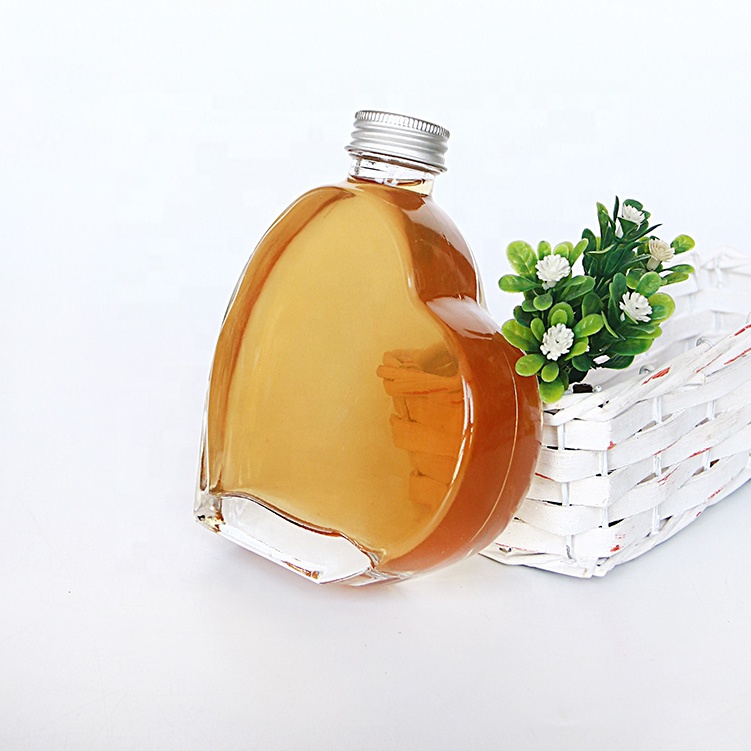 Innovation Unique 200ml Empty Clear Flat Glass Heart Beverage Bottles For Juice With Lid
