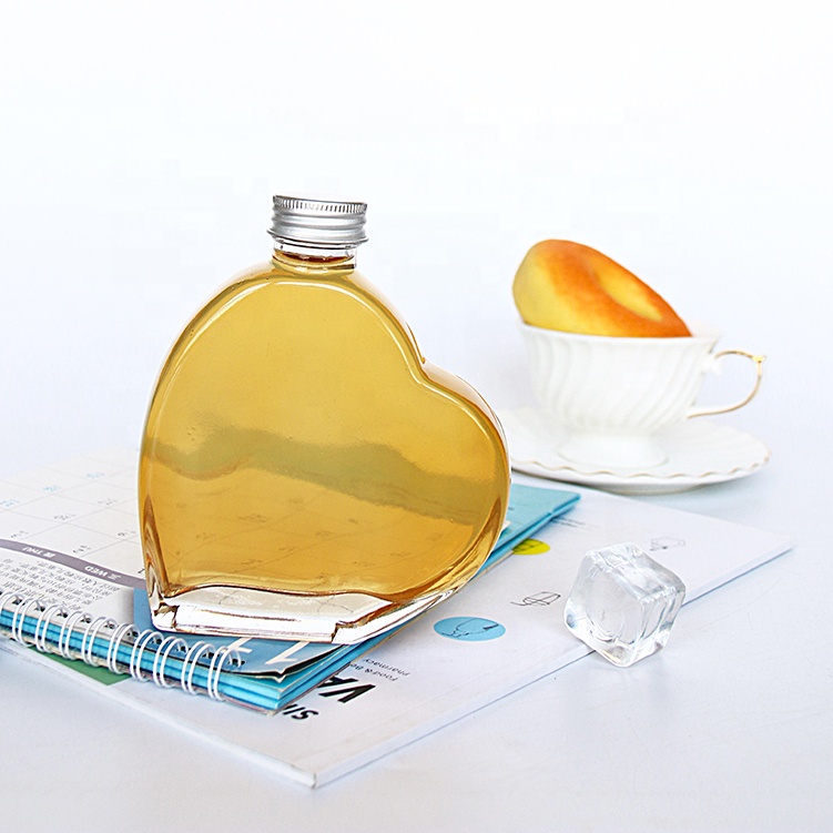 Innovation Unique 200ml Empty Clear Flat Glass Heart Beverage Bottles For Juice With Lid