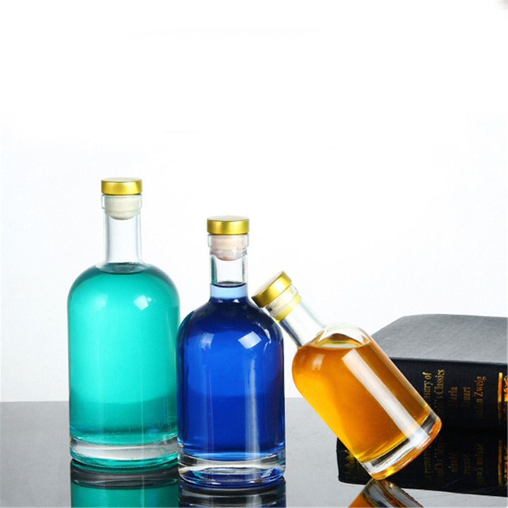 Iridescent custom logo round crystal white alcohol bottle with cork cap empty spirit bottle 200ml