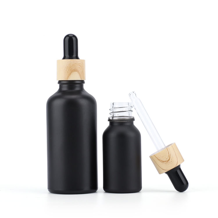JX Pack 30ml black frosted glass dropper bottles with childproof cap black glass dropper bottles wholesale beard oil essential o